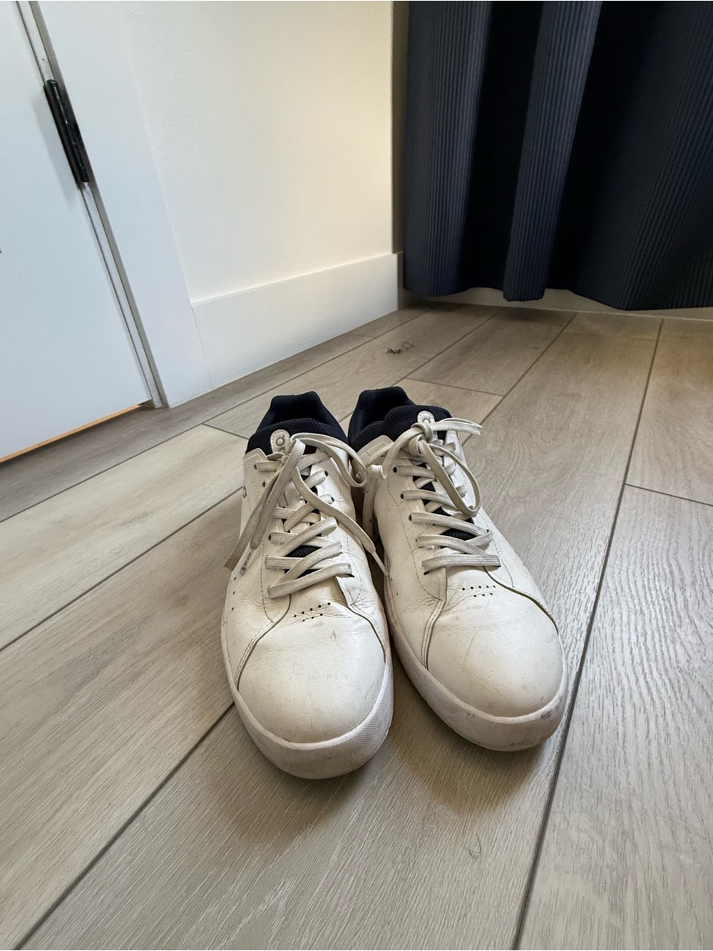 On Running White Low-Top Leather Sneakers with Black Collar